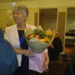 Barbara Taylor with flowers