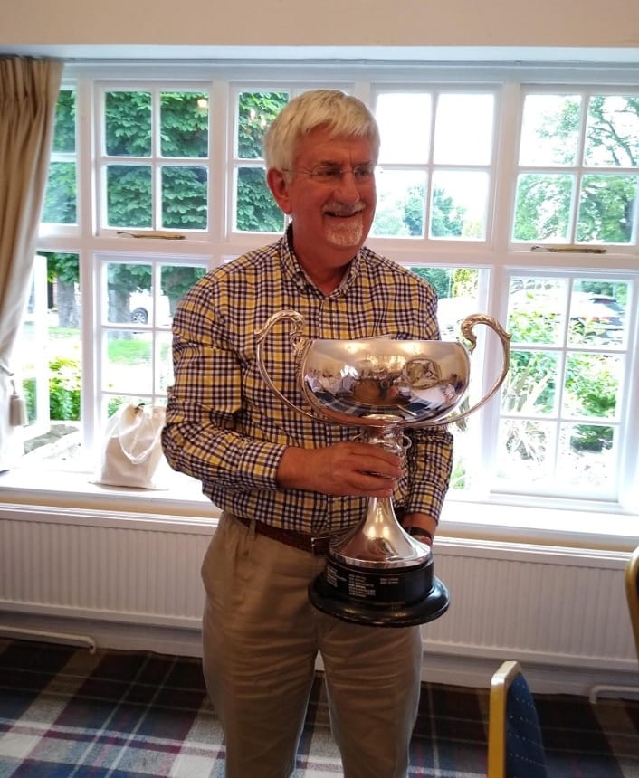 Mike holding the Fellowship Cup